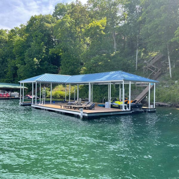 two docks with roof and sitting area